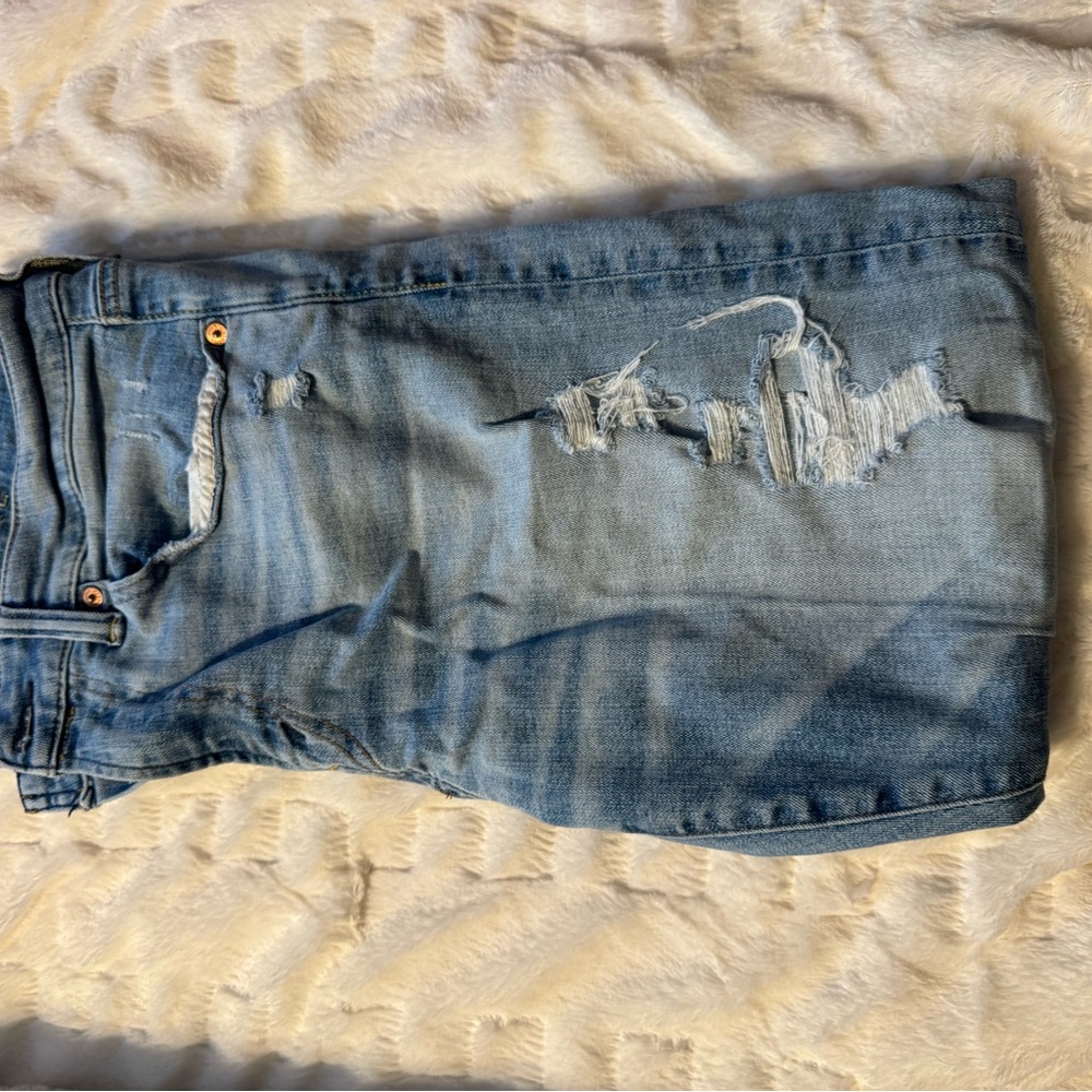 Distressed Blue Denim Jeans